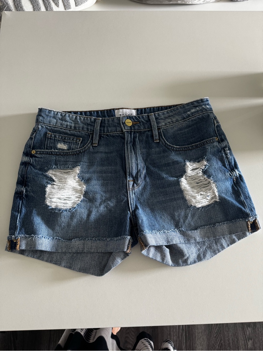 Frame Denim Distressed Rolled-Hem Jean Shorts in Dark Blue OBO
